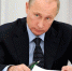 Путин за рабочим столом - Кремль - ИА Общественная служба новостей