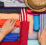 woman packing a luggage for a new journey - ИА Общественная служба новостей