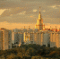 The tower of Moscow State University and Andrey Rublev modern church surrounded by residential houses in Ramenki district, sunset, of Moscow. - Мой район